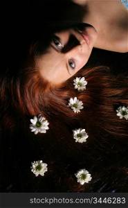 beautiful white flowers in girl hair