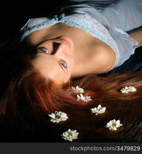 beautiful white flowers in girl hair