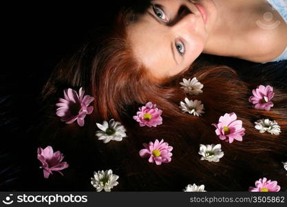 beautiful white flowers in girl hair