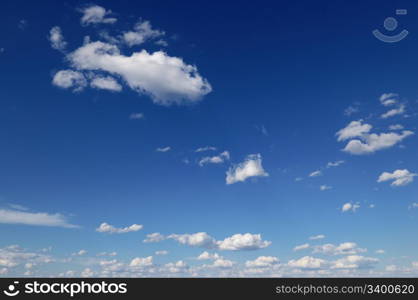 beautiful white fluffy clouds in the blue sky