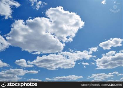 beautiful white fluffy clouds in the blue sky