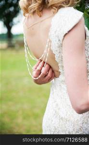 beautiful white lace bride&rsquo;s back - bare shoulders. beautiful white lace bride&rsquo;s back, bare shoulders