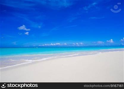 Beautiful white sand beach and turquoise clean water on tropical exotic island