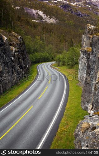 beautiful windy road at the norwegian mountains
