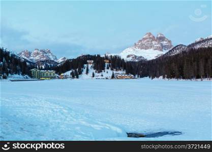 Beautiful winter frozen up Alpine lake Misurina view at Auronzo di Cadore (Italy)