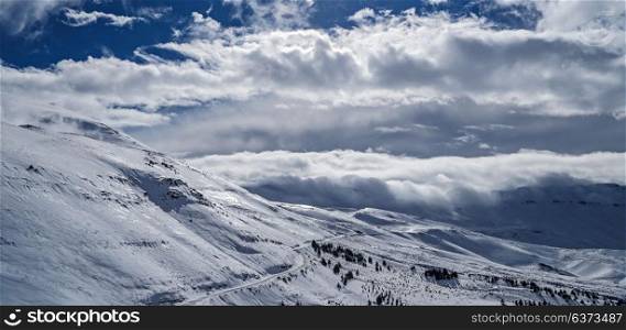 Beautiful winter landscape, high mountains covered with white snow on bright sunny day, Cedars Mountains, Lebanon
