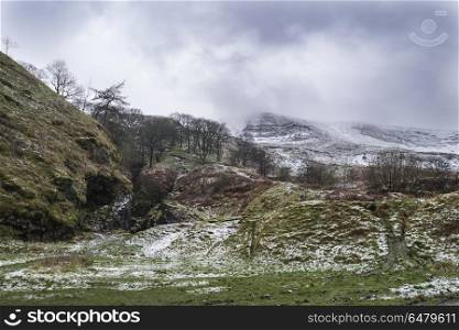 Beautiful Winter landscape image around Mam Tor countryside in P. Stunning Winter landscape image around Mam Tor countryside in Peak District England
