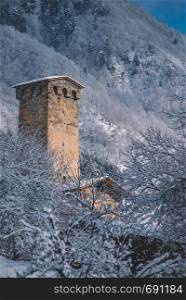 Beautiful Winter landscape with old castle in Georgia Svaneti, Mestia in snow