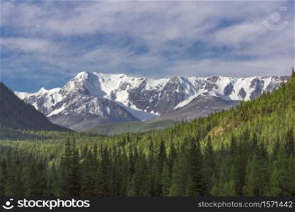 Beautiful winter landscape with snow covered mountain peaks.. Beautiful winter landscape with snow covered mountain peaks