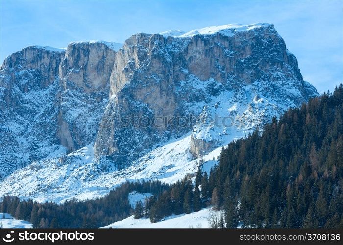 Beautiful winter rocky mountain landscape. Italy Dolomites, at the foot of Passo Gardena, South Tyrol.