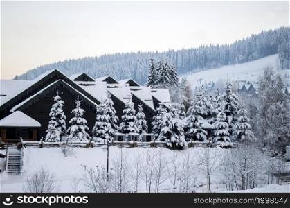 beautiful winter street Bukovel, the theme of mountain sports, skiing, Bukovel, Carpathian, mountains Ukraine, new year, Christmas, holidays