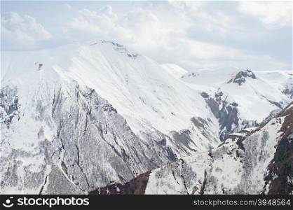 Beautiful winter view of Caucasus mountains in the day. Georgian republic