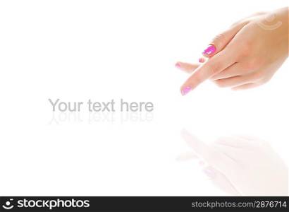 Beautiful woman&acute;s hand pointing to something isolated on white background