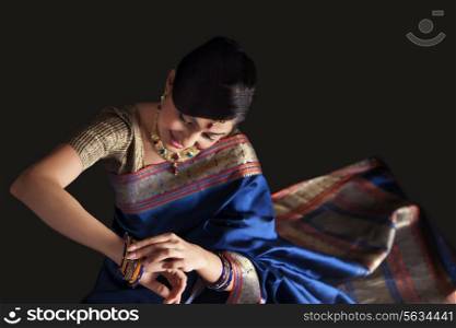 Beautiful woman admiring her bangles