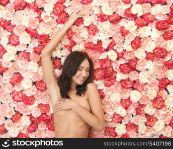 beautiful woman and background full of roses