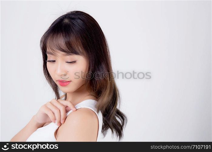 Beautiful woman asian makeup of cosmetic, beauty asia girl hand touch shoulder and smile attractive, face of beauty perfect with wellness isolated on white background with skin healthcare concept.