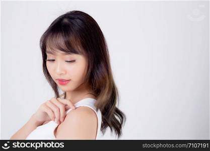 Beautiful woman asian makeup of cosmetic, beauty asia girl hand touch shoulder and smile attractive, face of beauty perfect with wellness isolated on white background with skin healthcare concept.