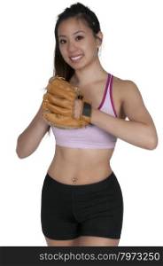 Beautiful woman baseball pitcher getting ready to throw a ball in a game