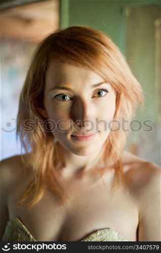 Beautiful Woman. Beautiful Woman with Red hair in an abandoned house