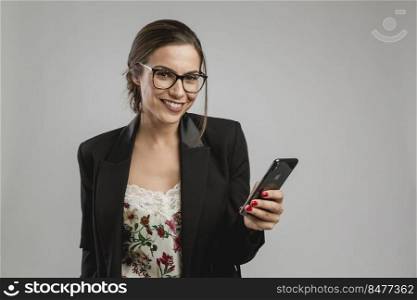 Beautiful woman checking her cellphone