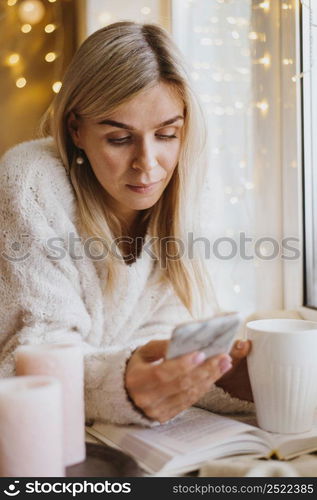 beautiful woman checking her phone