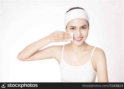 beautiful woman cleansing her face