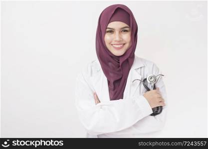 Beautiful woman doctor with hijab portrait on white background