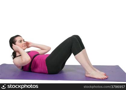 Beautiful woman doing her Yoga stance exercises