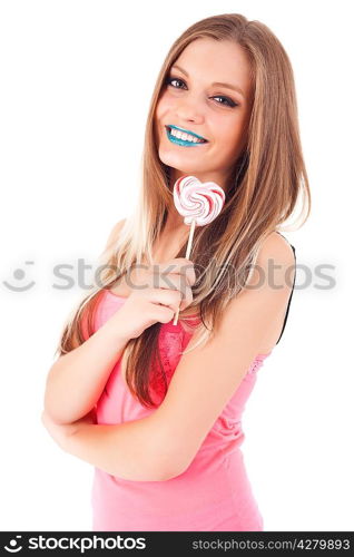 Beautiful woman eating a lollipop, over white background