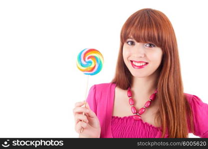 Beautiful woman eating a lollipop, over white background