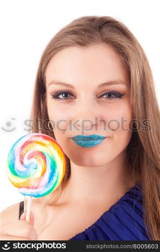 Beautiful woman eating lollipop, over white background