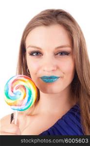 Beautiful woman eating lollipop, over white background
