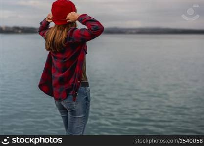 Beautiful woman enjoying her day on the lake