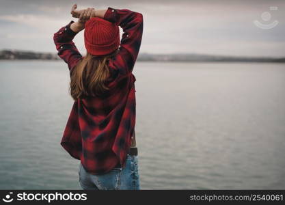 Beautiful woman enjoying her day on the lake