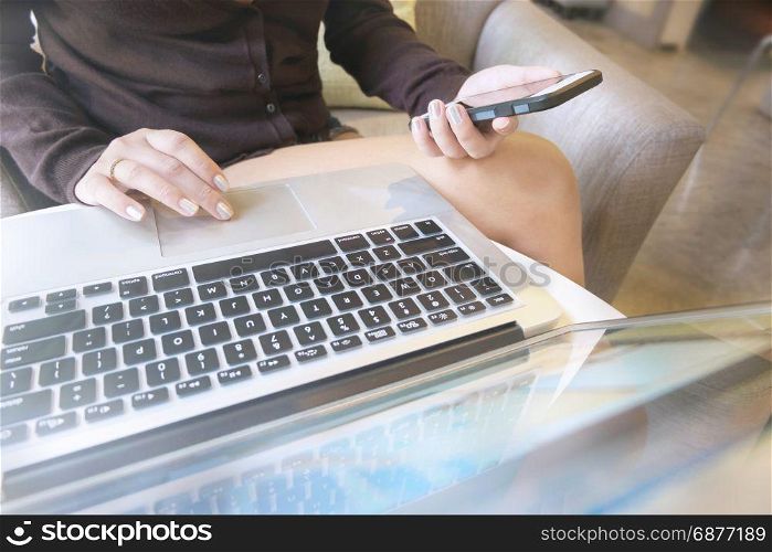 Beautiful Woman Explore Online Shopping Website. Close up hands of young woman shopping online by using laptop