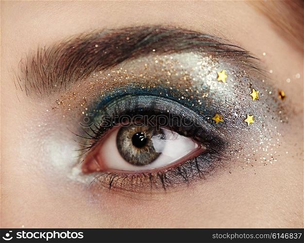 Beautiful woman eye. Perfect makeup. Beauty fashion. Eyelashes. Lips. Cosmetic Eyeshadow. Make-up detail. Eyeliner.