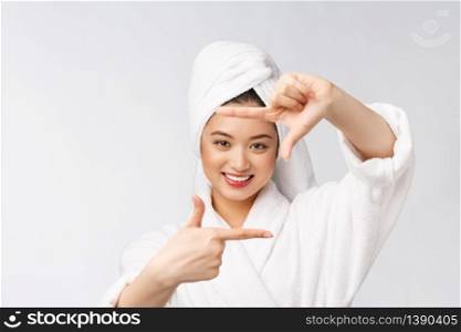 Beautiful Woman face and she making frame with hands with health skin, concept for skin care , asian beauty. Beautiful Woman face and she making frame with hands with health skin, concept for skin care , asian beauty.