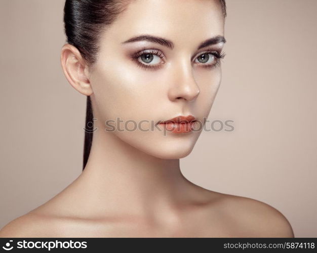 Beautiful woman face. Perfect makeup. Beauty fashion. Eyelashes. Cosmetic Eyeshadow. Highlighting