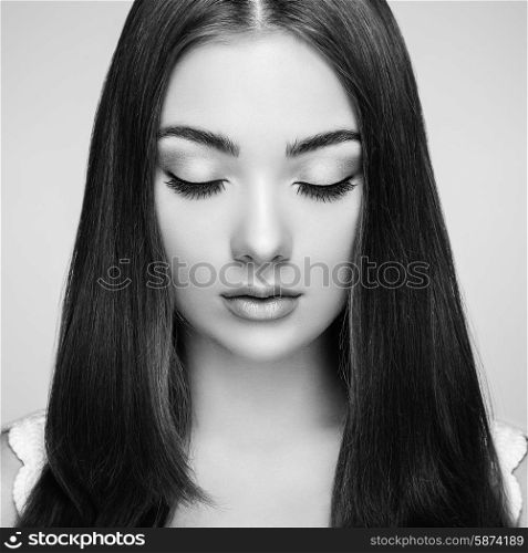 Beautiful woman face. Perfect makeup. Beauty fashion. Eyelashes. Cosmetic Eyeshadow. Black and white