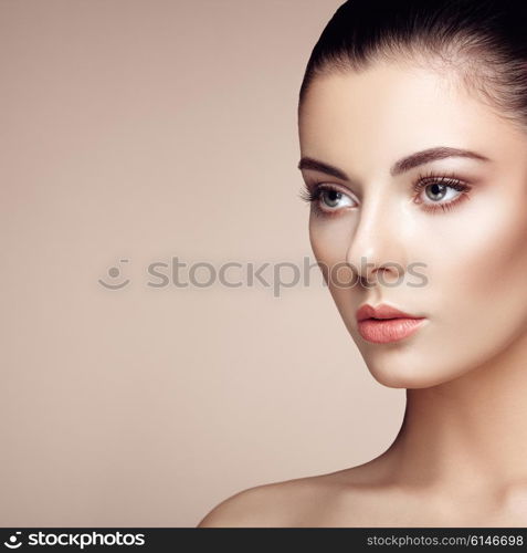 Beautiful woman face. Perfect makeup. Beauty fashion. Eyelashes. Cosmetic Eyeshadow. Highlighting