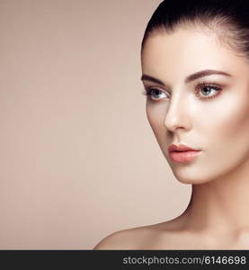 Beautiful woman face. Perfect makeup. Beauty fashion. Eyelashes. Cosmetic Eyeshadow. Highlighting