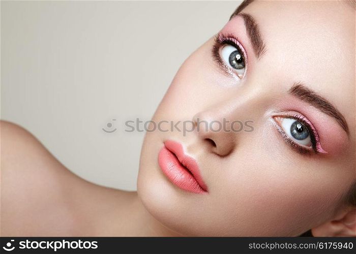 Beautiful woman face. Perfect makeup. Beauty fashion. Eyelashes. Cosmetic Eyeshadow. Perfect skin