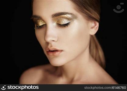 Beautiful woman face. Perfect makeup. Beauty fashion. Eyelashes. Lips. Cosmetic Eyeshadow. Make-up detail. Eyeliner