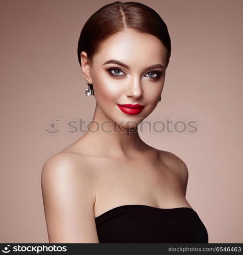 Beautiful woman face with perfect makeup. Beautiful Young Woman with Clean Fresh Skin. Perfect Makeup. Beauty Fashion. Eyelashes. Cosmetic Eyeshadow. Highlighting. Cosmetology, Beauty and Spa