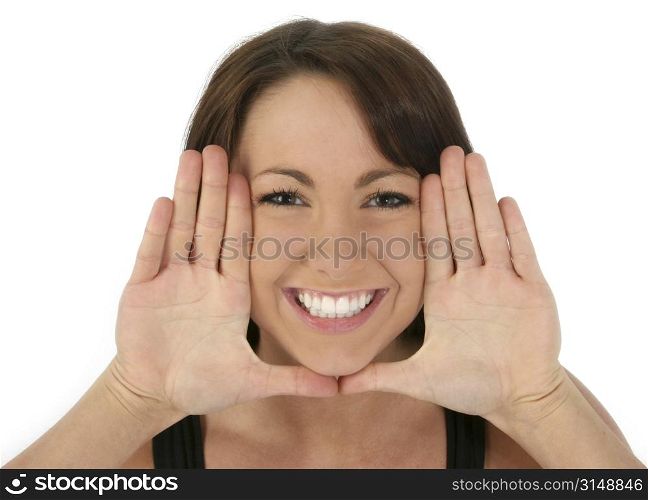 Beautiful woman framing face with hands. Palms out.
