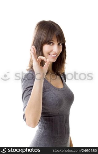 Beautiful woman gesturing an excellent job sign isolated over white background