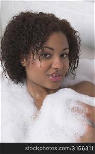 Beautiful woman having a bubblebath
