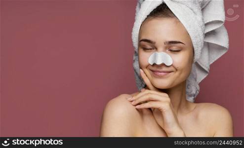 beautiful woman having nose patch mask