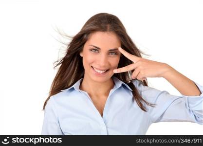 Beautiful woman hiding her eyes with fingers