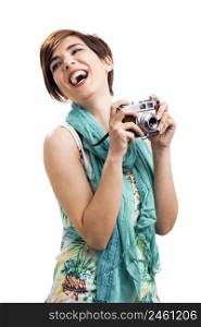 Beautiful woman holding a vintage camera, isolated over a white background. Woman with a vintage camera